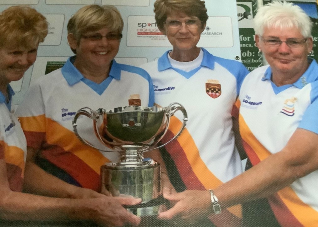 Norma Beales with team